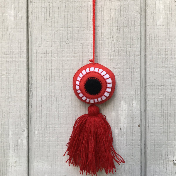 Package of 12 Handmade Mexican Evil Eye Pom Poms - Red